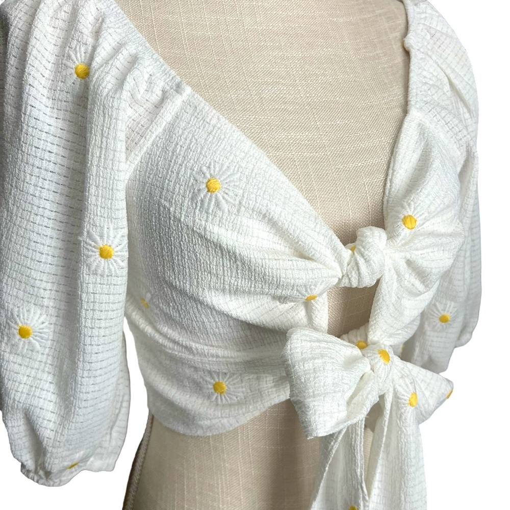 Love & Pieces cropped waffled puff sleeve daisy embroidered tie front top